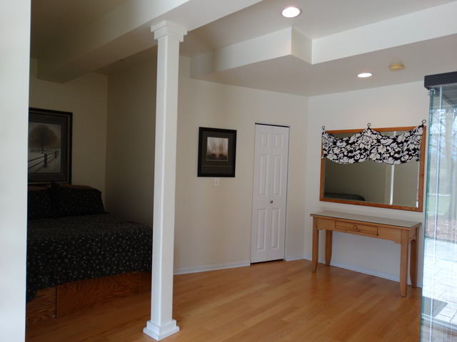 544 Birch Road Woodstock, IL 60098 - Photo 18 of 25 a view of a hallway with workspace