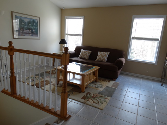544 Birch Road Woodstock, IL 60098 - Photo 2 of 25 a living room with furniture and a window