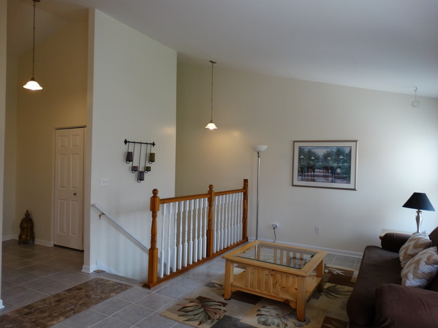 544 Birch Road Woodstock, IL 60098 - Photo 8 of 25 a living room with furniture and a window