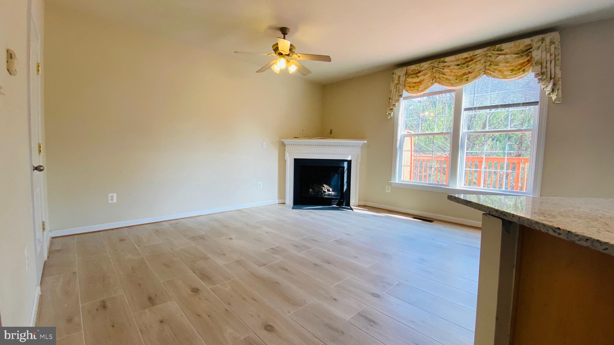 8853 Modano Place Fairfax, VA 22031 - Photo 11 of 32 Family room off kitchen