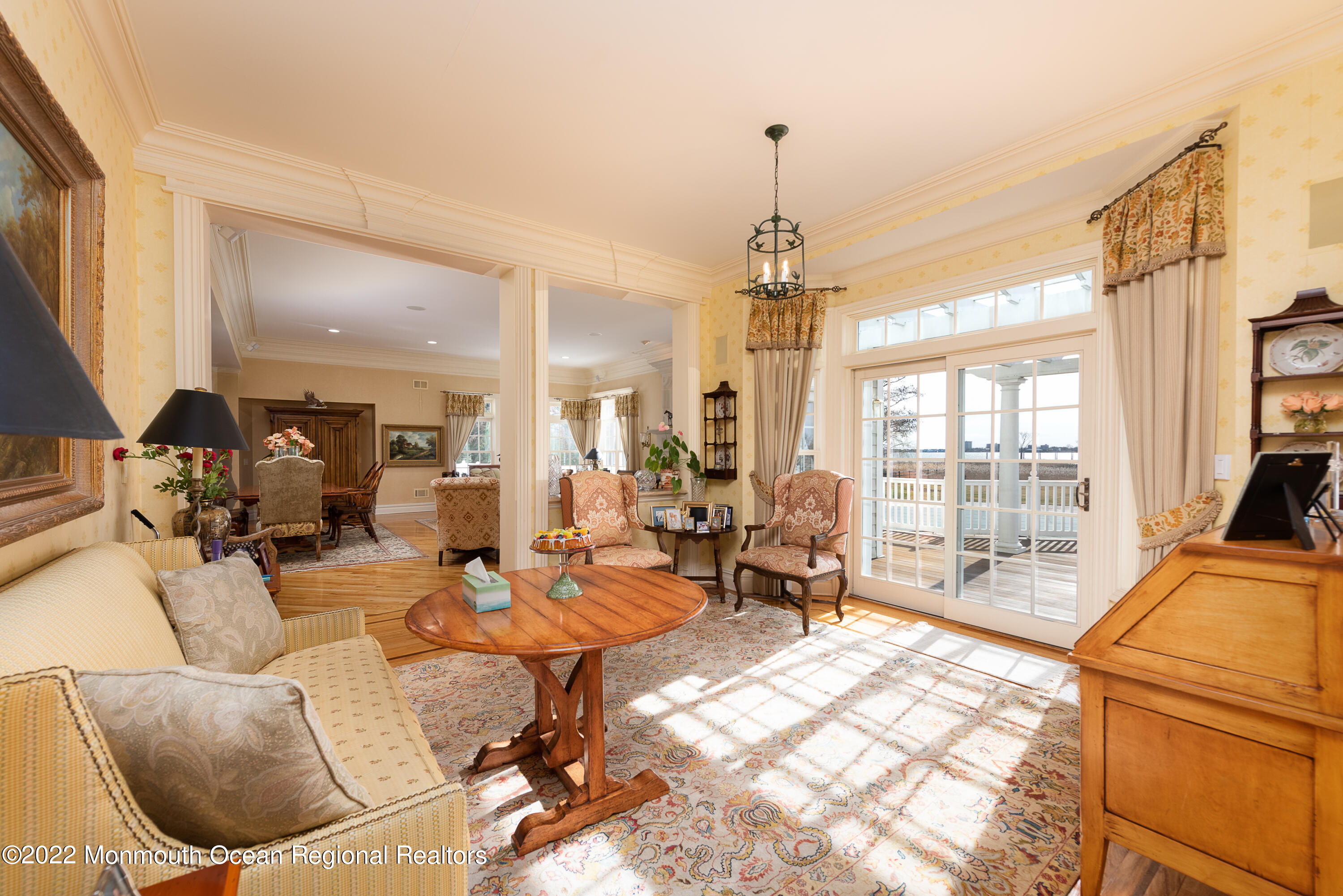 24 Conover Lane Rumson, NJ 07760 - Photo 13 of 39 a living room with furniture and a chandelier