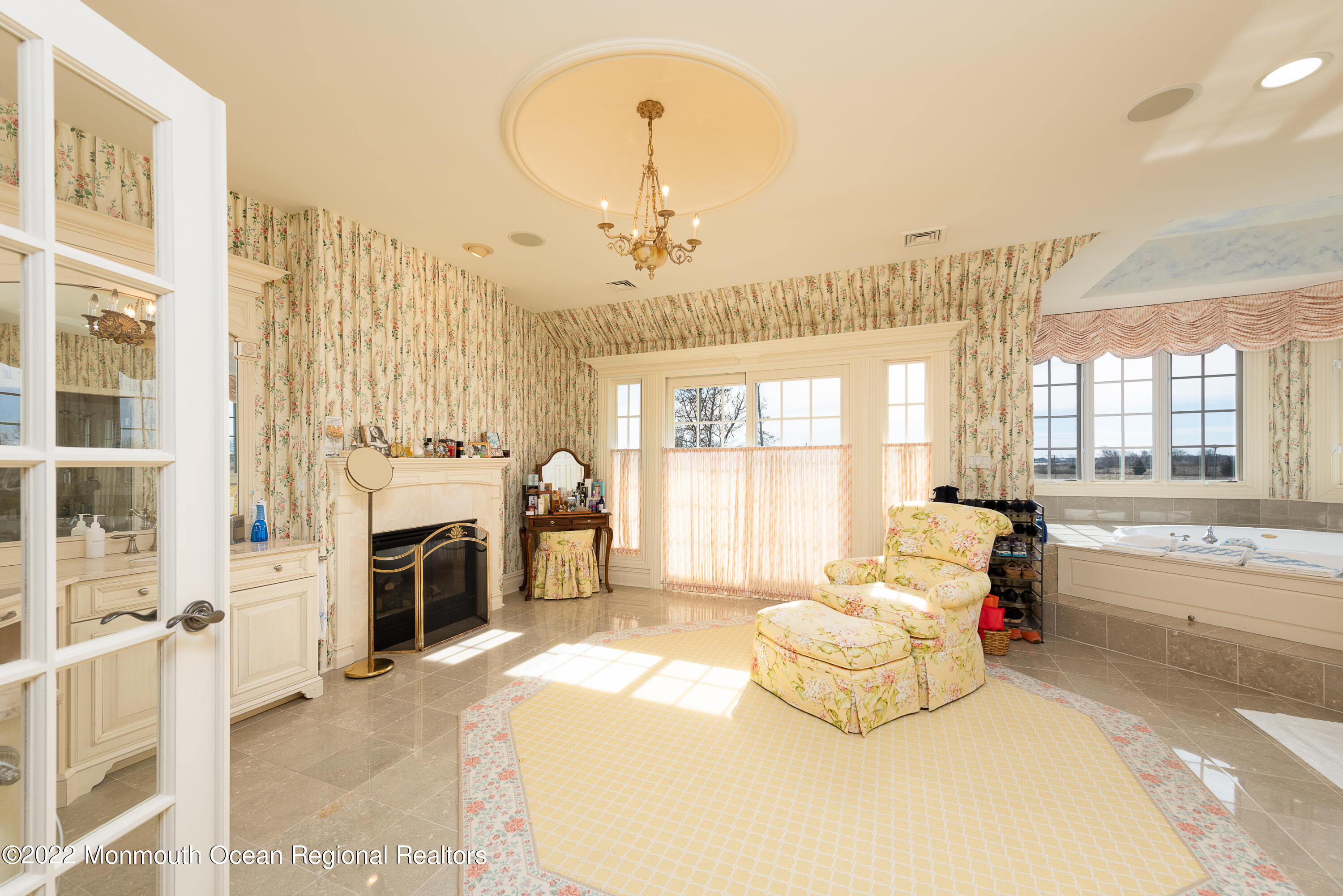 24 Conover Lane Rumson, NJ 07760 - Photo 23 of 39 a spacious bedroom with a bed and a large window
