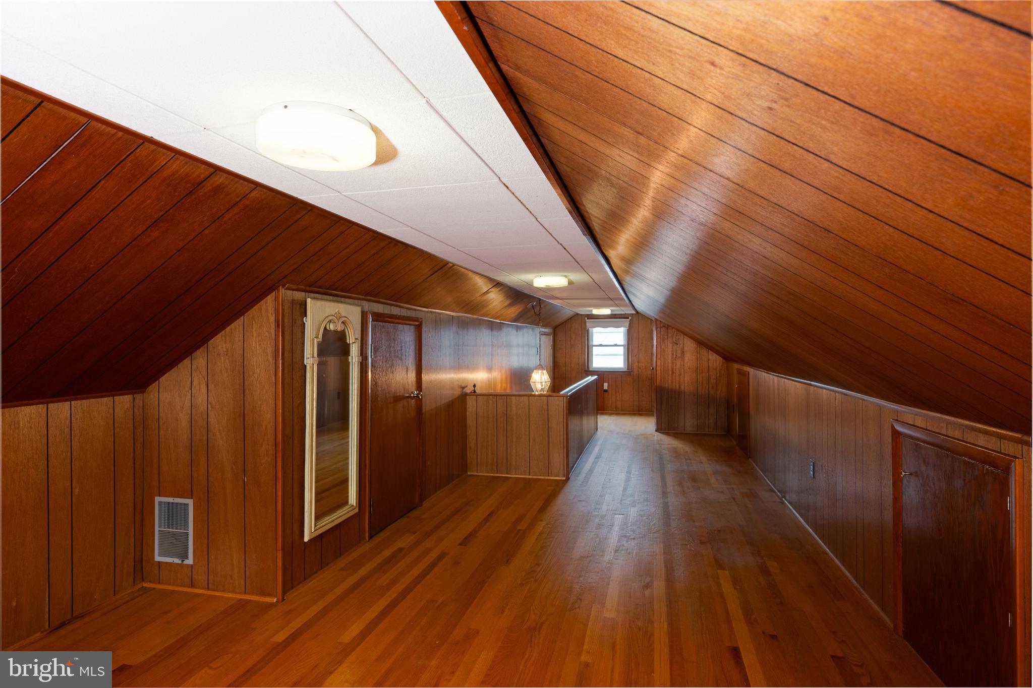 2 Norva Avenue Frederick, MD 21701 - Photo 20 of 36 a view of a hallway with wooden floor