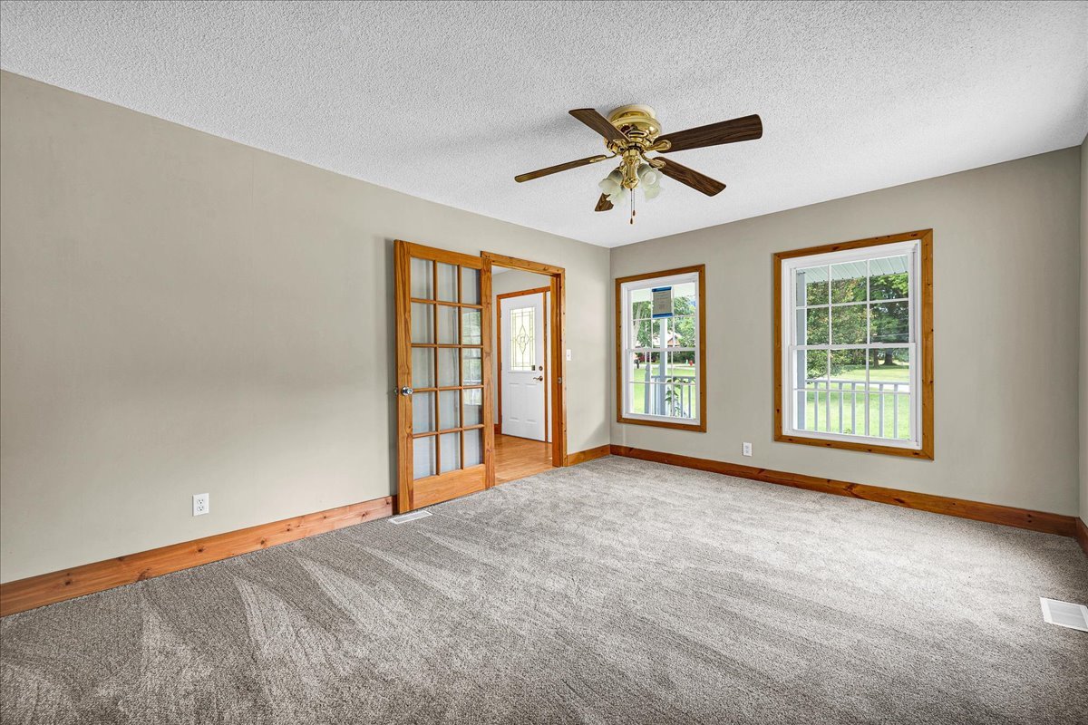 116 Lakeview Road East Galesburg, IL 61430 - Photo 5 of 36 a view of an empty room with a window
