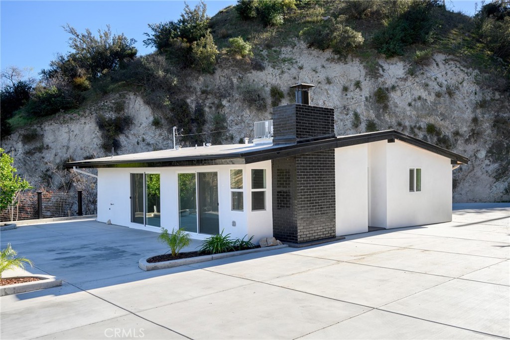 a front view of a house with yard
