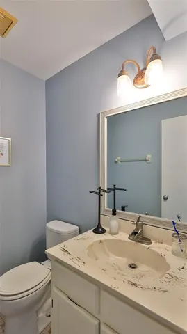 a bathroom with a sink and a toilet