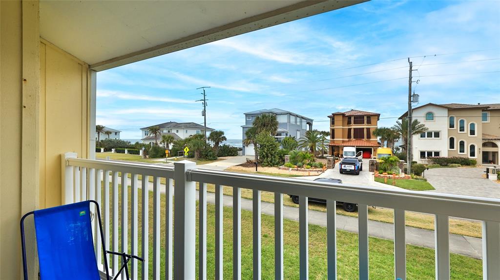4740 South Atlantic Avenue, Unit 4 Ponce Inlet, FL 32127 - Photo 26 of 38 a view of a city from a balcony