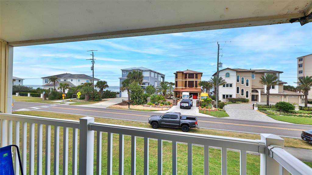 4740 South Atlantic Avenue, Unit 4 Ponce Inlet, FL 32127 - Photo 27 of 38 a view of a city from a balcony