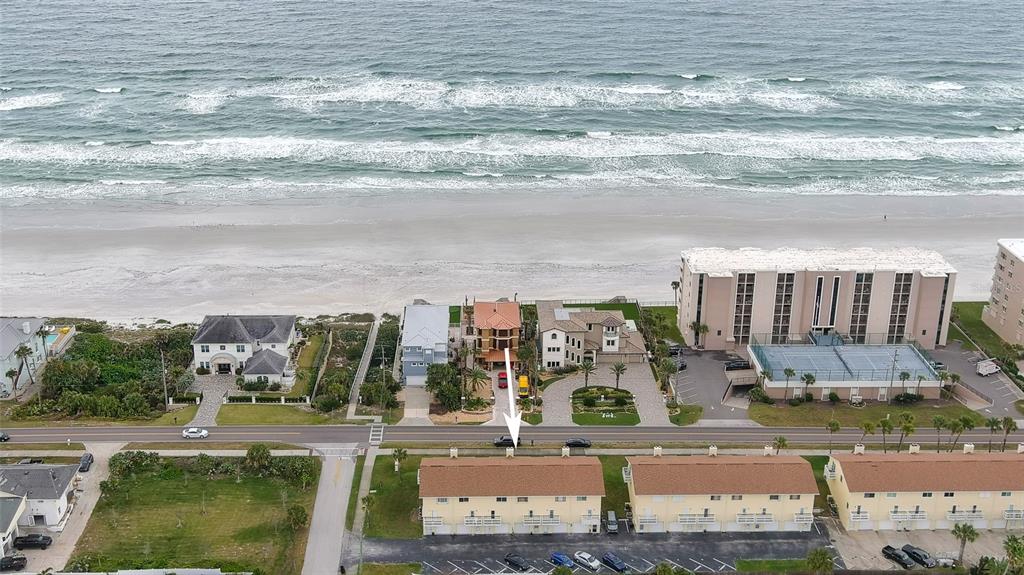 4740 South Atlantic Avenue, Unit 4 Ponce Inlet, FL 32127 - Photo 31 of 38 a city view with tall buildings