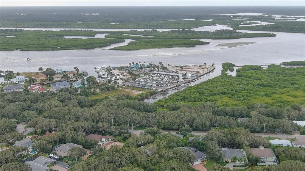 4740 South Atlantic Avenue, Unit 4 Ponce Inlet, FL 32127 - Photo 37 of 38 a view of a lake with a mountain