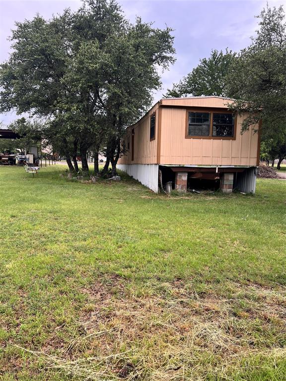 3400 Surfside Drive May, TX 76857 - Photo 11 of 39 a view of a house with a yard