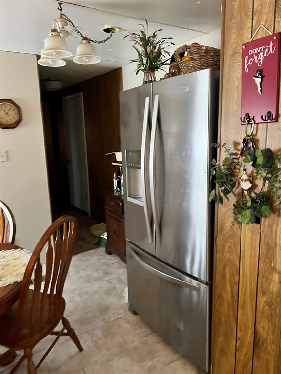 3400 Surfside Drive May, TX 76857 - Photo 27 of 39 a metallic refrigerator freezer sitting in a kitchen