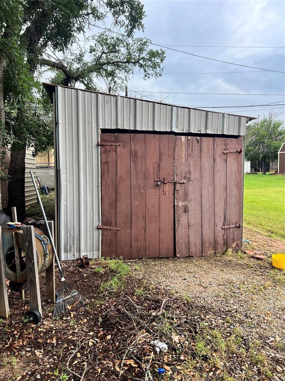 3400 Surfside Drive May, TX 76857 - Photo 6 of 39 a view of a backyard with wooden fence