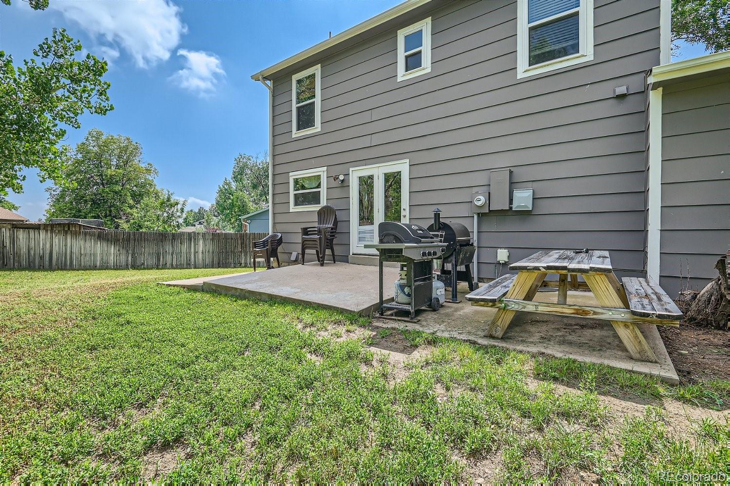 11099 Fairfax Circle Thornton, CO 80233 - Photo 30 of 33 a view of a house with backyard