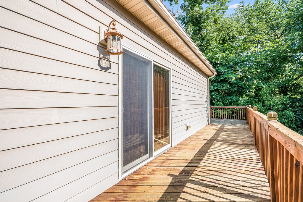 331 Rickert Street Hinckley, IL 60520 - Photo 15 of 19 a view of a house with a wooden deck