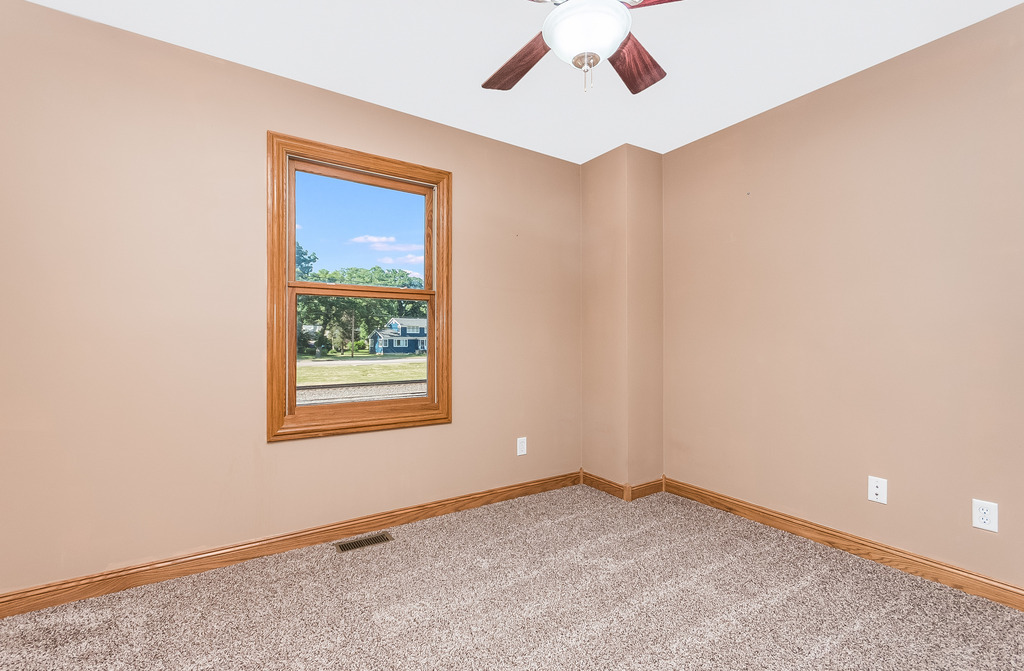331 Rickert Street Hinckley, IL 60520 - Photo 10 of 19 an empty room with a window