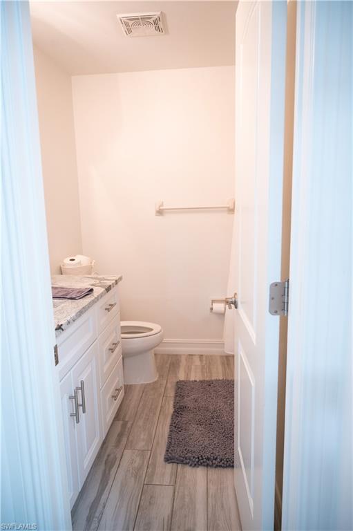 136 Harrison Road, Unit L3 Naples, FL 34112 - Photo 32 of 50 a bathroom with a sink a toilet and a shower