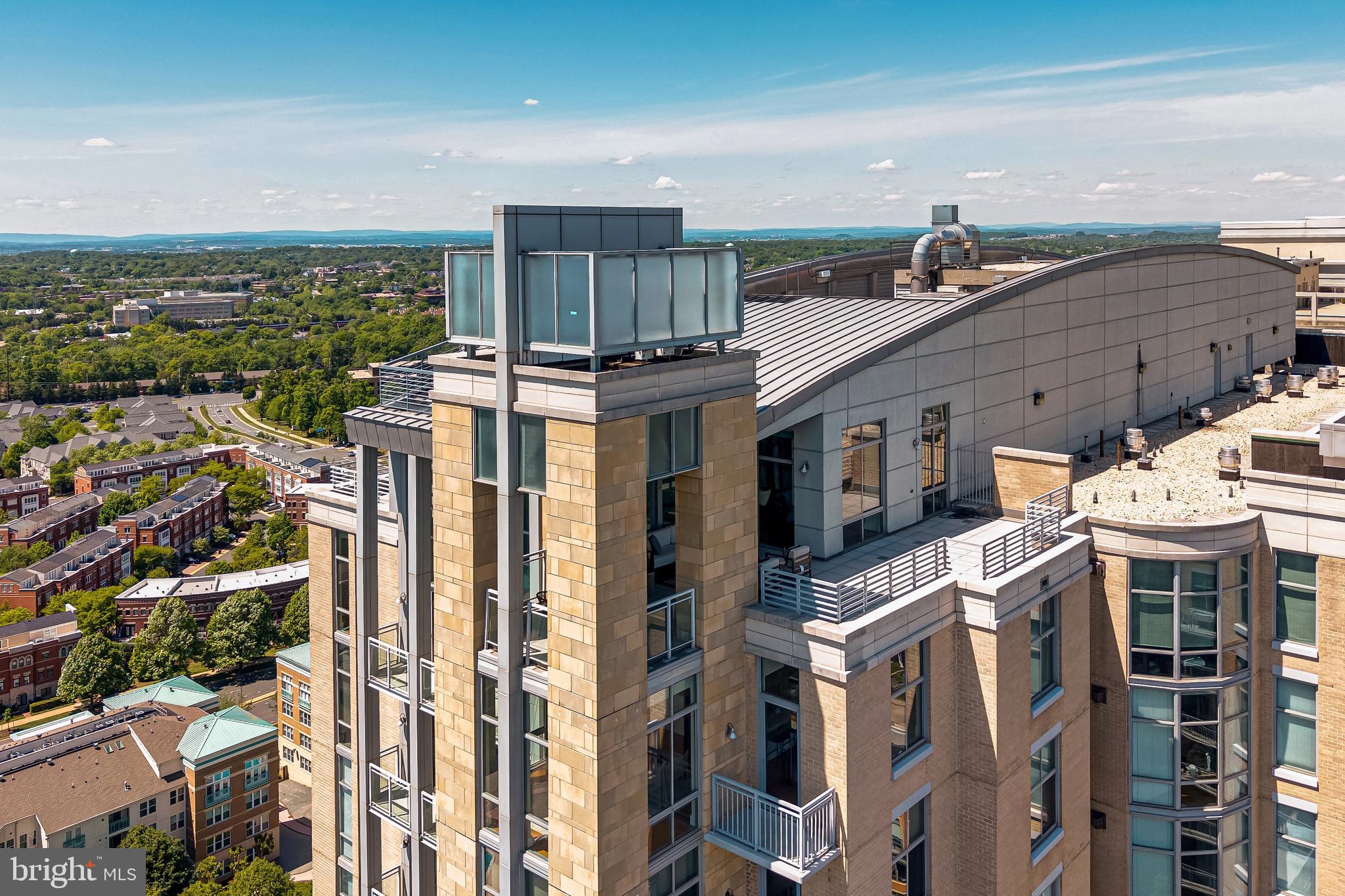 11990 Market Street, Unit 2112 Reston, VA 20190 - Photo 63 of 92 a view of a city with tall buildings