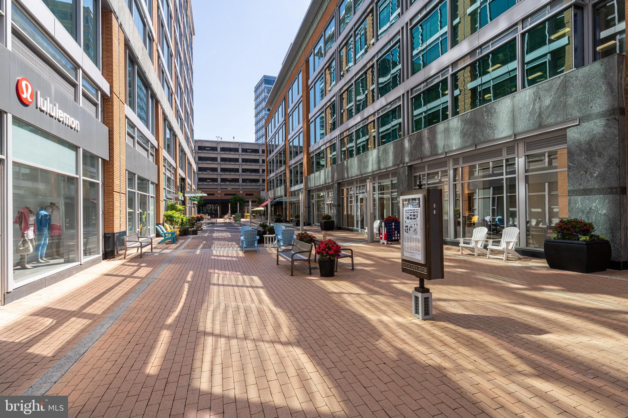 11990 Market Street, Unit 2112 Reston, VA 20190 - Photo 80 of 92 a view of a building with sitting area