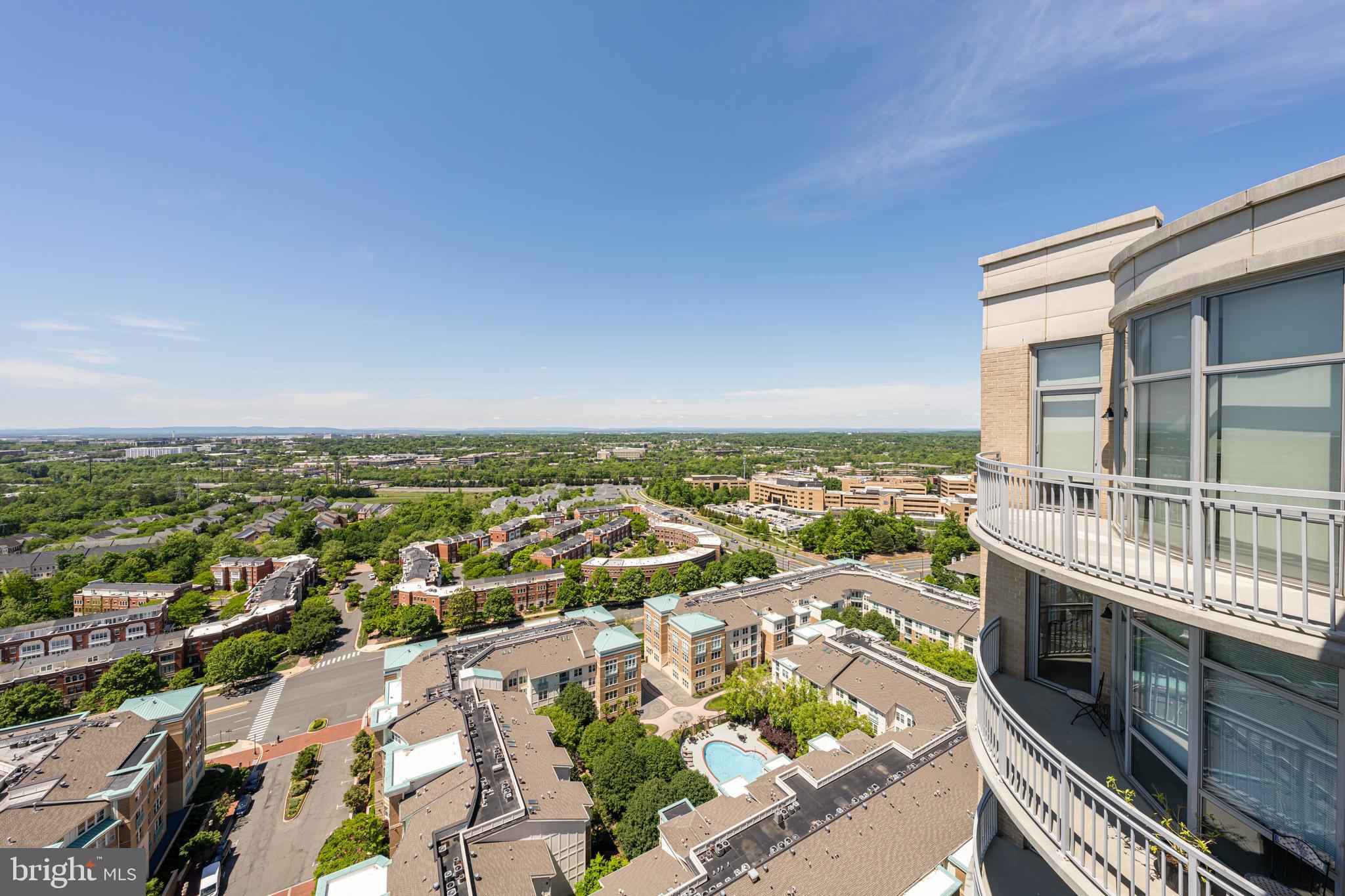 11990 Market Street, Unit 2112 Reston, VA 20190 - Photo 9 of 92 an aerial view of residential houses with city view