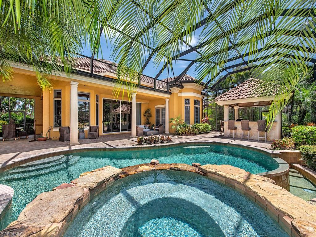 14903 Bellezza Lane Naples, FL 34110 - Photo 15 of 25 a view of a house with backyard and sitting area