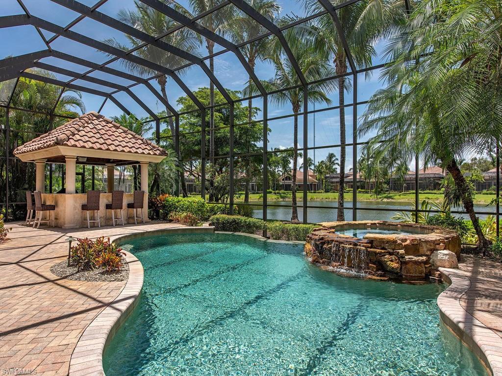 14903 Bellezza Lane Naples, FL 34110 - Photo 16 of 25 a view of a house with backyard and sitting area