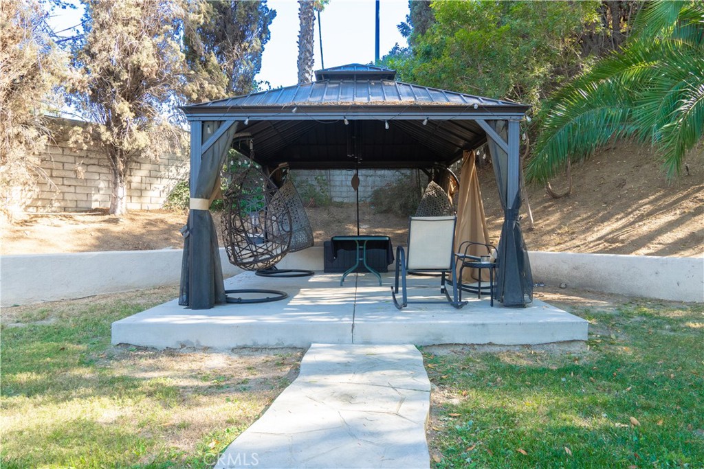 2122 Trafalgar Avenue Riverside, CA 92506 - Photo 16 of 18 a view of yard with patio