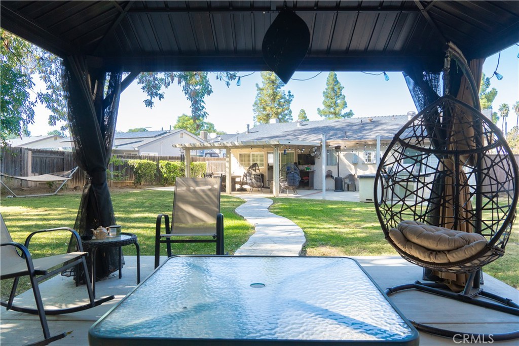 2122 Trafalgar Avenue Riverside, CA 92506 - Photo 17 of 18 a view of a porch with furniture and a yard