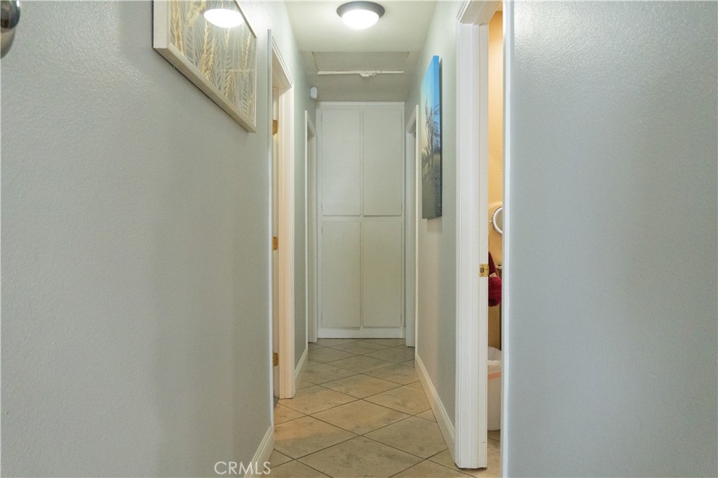 2122 Trafalgar Avenue Riverside, CA 92506 - Photo 8 of 18 a view of a bathroom from a corridor