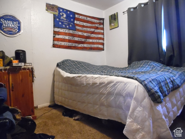 477 Grand Circle Moab, UT 84532 - Photo 12 of 22 View of carpeted bedroom