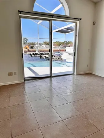 a view of a bathroom with a glass door