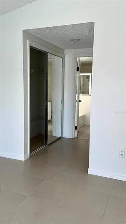 an empty room that has a bathroom