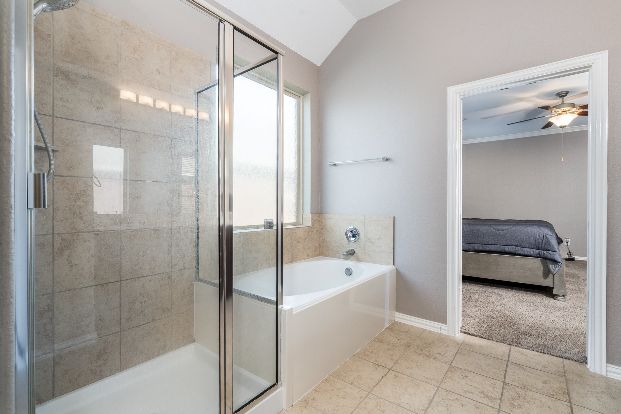 17823 Dappled Walk Way Cypress, TX 77429 - Photo 14 of 23 a bathroom with a tub shower and sink