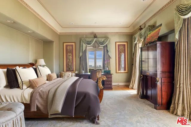 a bathroom with a granite countertop sink a mirror a bathtub and shower