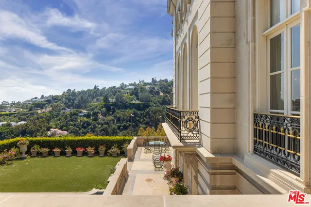 a view of a table and chairs in the patio