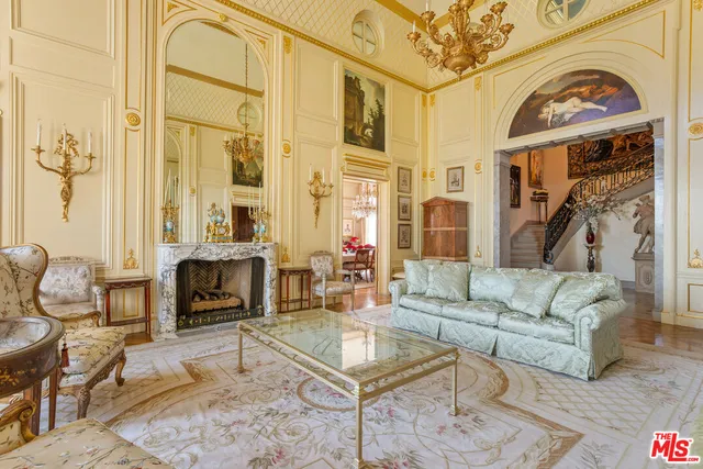a view of a living room and bathroom