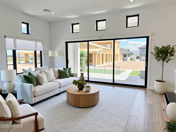 a spacious bedroom with a bed and a couch