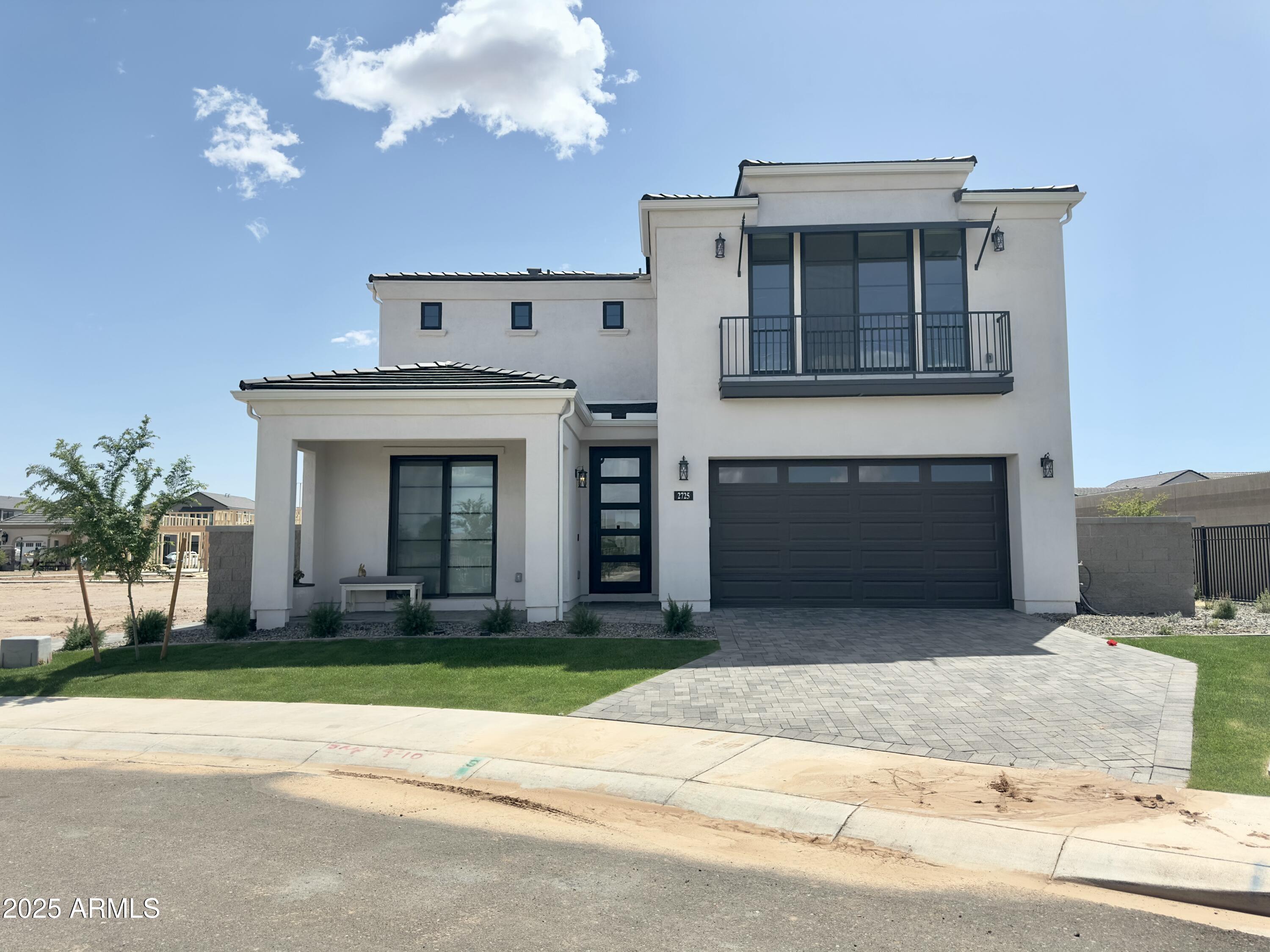 2725 East Derringer Court Gilbert, AZ 85297 - Photo 2 of 56 a view of a house with a yard in front of it