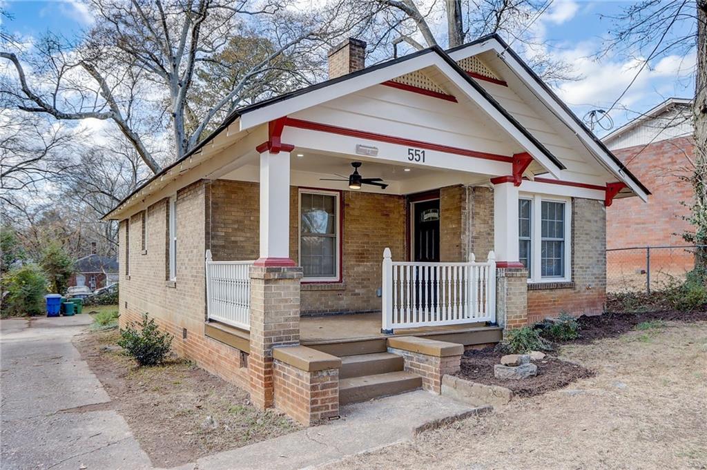 551 Culberson Street Southwest Atlanta, GA 30310 - Photo 1 of 1 a front view of a house with garden