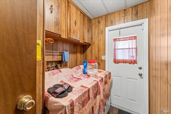 a close view of a dining table and chairs