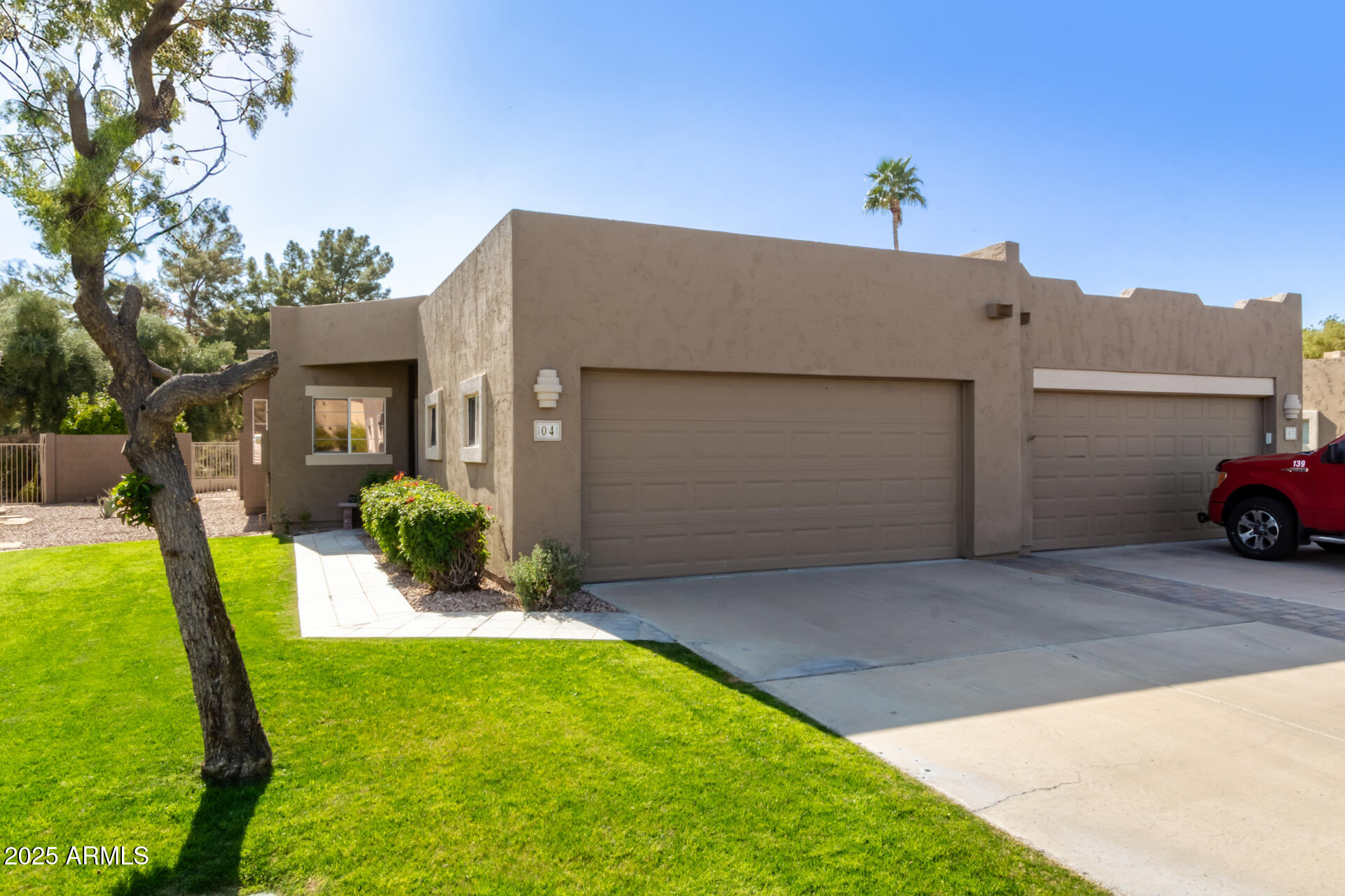 6001 East Southern Avenue, Unit 4 Mesa, AZ 85206 - Photo 13 of 23 a view of a house with a yard