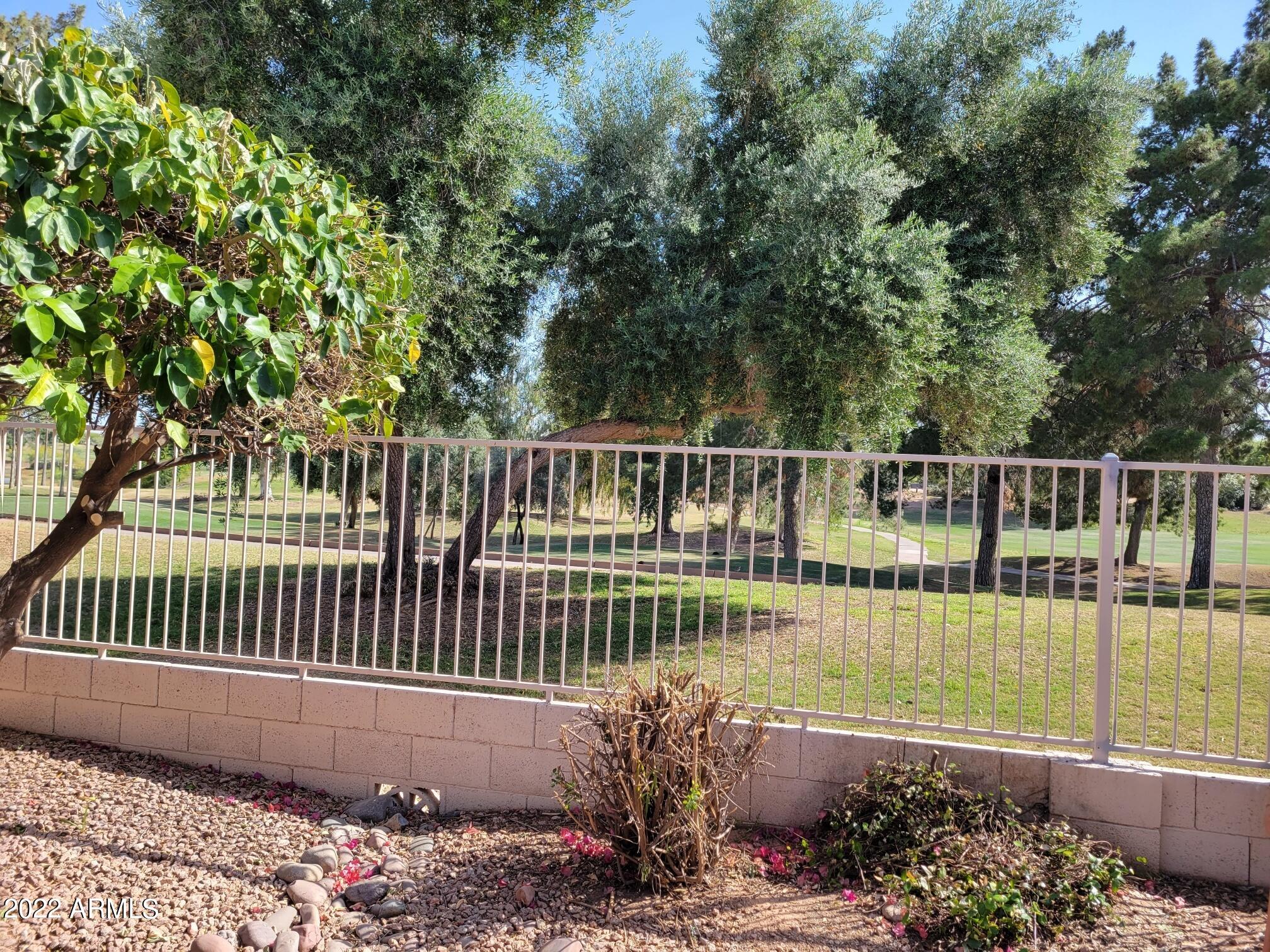 6001 East Southern Avenue, Unit 4 Mesa, AZ 85206 - Photo 9 of 23 a view of a deck with a garden