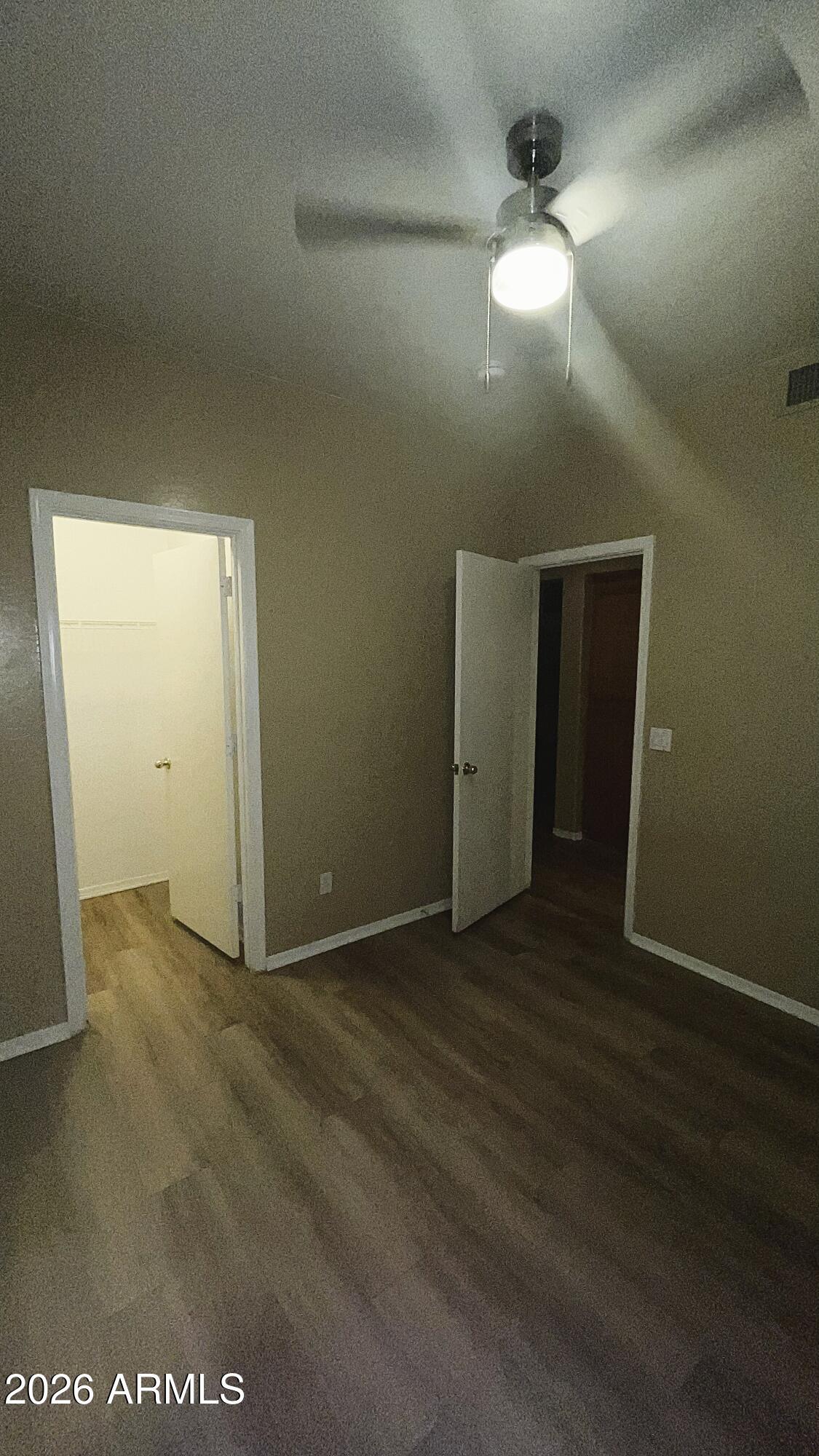 10640 West Coronado Road Avondale, AZ 85392 - Photo 14 of 26 an empty room with closet area