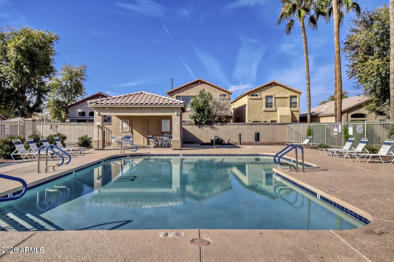 10640 West Coronado Road Avondale, AZ 85392 - Photo 23 of 26 a view of a house with pool