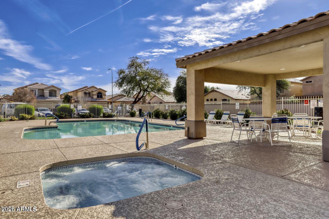 10640 West Coronado Road Avondale, AZ 85392 - Photo 25 of 26 a view of a house with a entertaining space