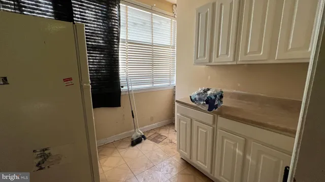 a bathroom with a sink and a window