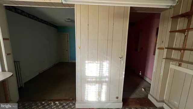 a view of a hallway with closet