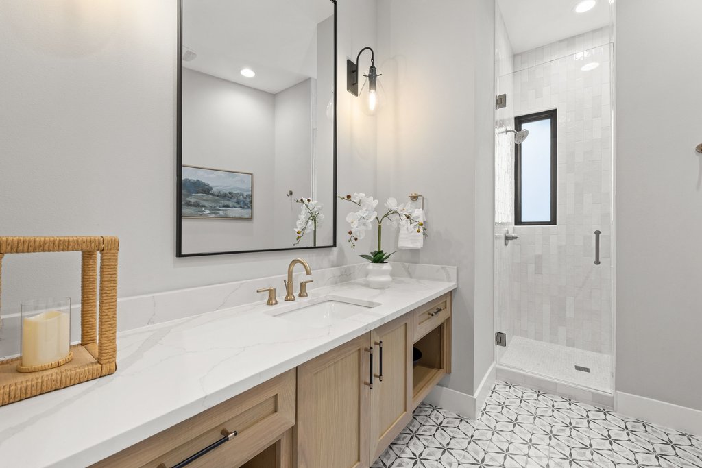 6316 Caudill Lane Austin, TX 78738 - Photo 19 of 40 Bathroom featuring vanity, a shower stall, light tile patterned floors, and recessed lighting