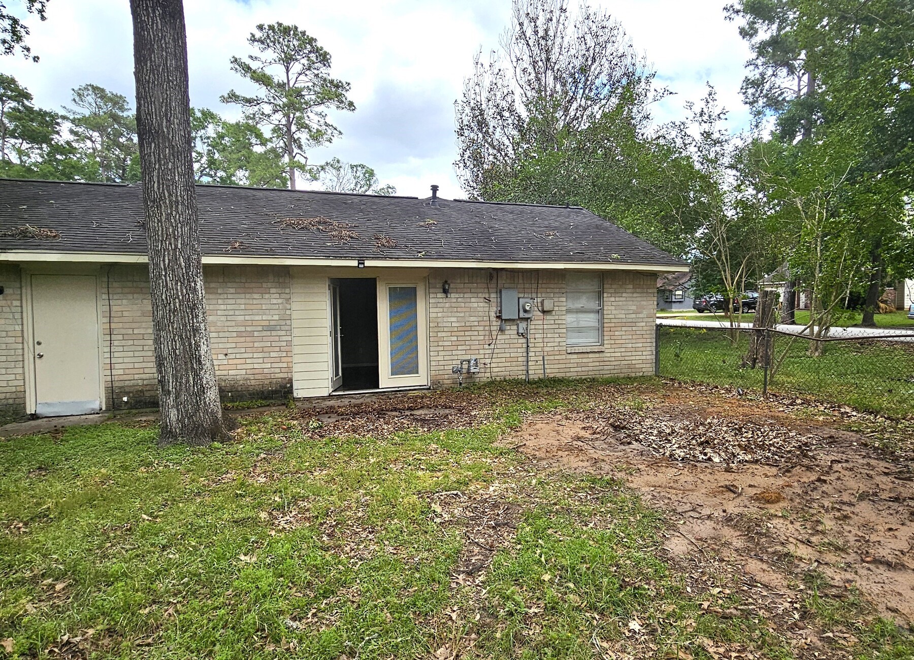 3303 Roaming Woods Lane Spring, TX 77380 - Photo 17 of 21 a house view with a garden space