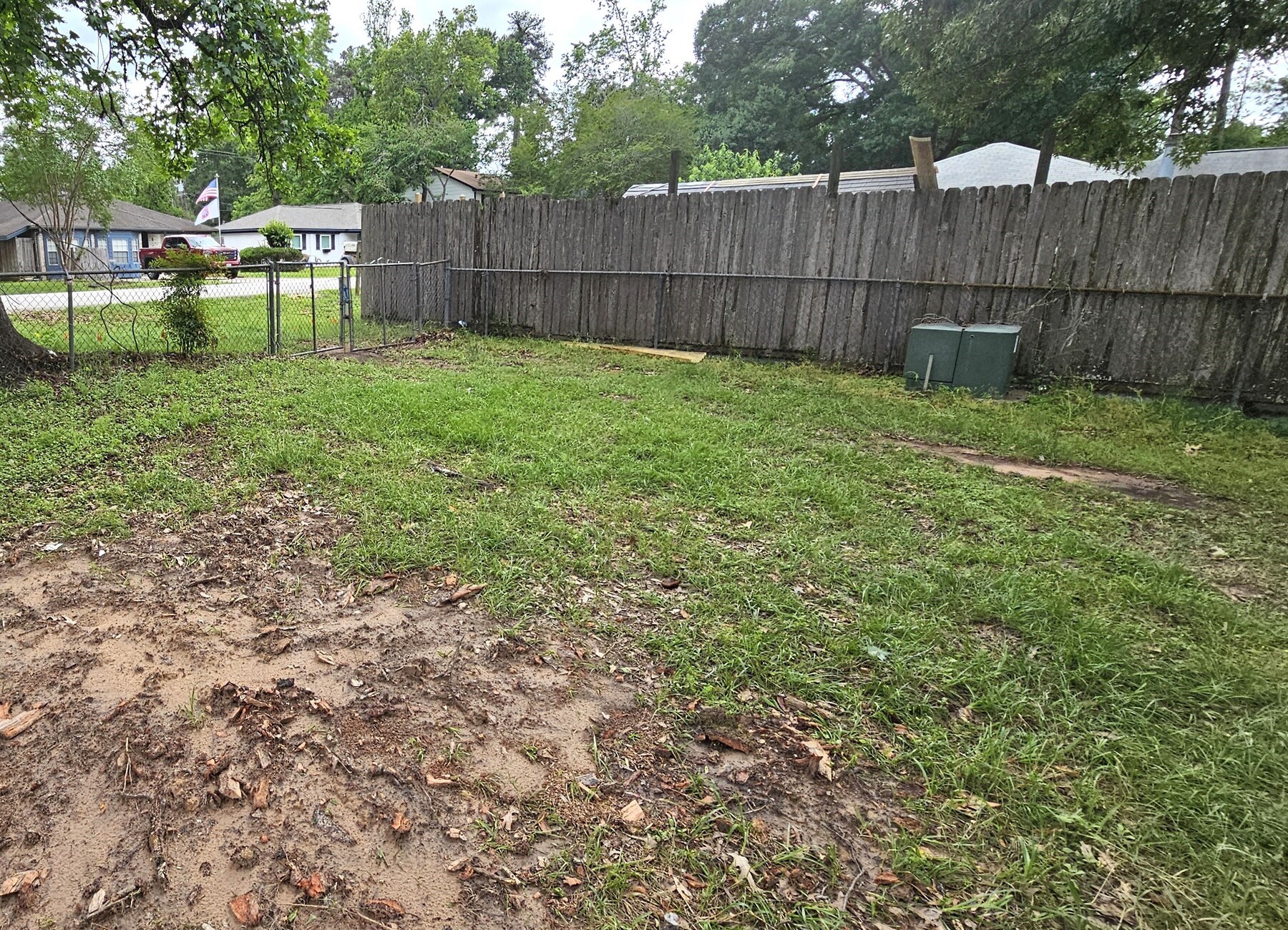 3303 Roaming Woods Lane Spring, TX 77380 - Photo 20 of 21 a view of a backyard with tree